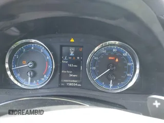 2017 Toyota Corolla L z VIN 5YFBURHE0HP721258, wystawiony jako IAAI lot #41706824 z przebiegiem 158 554 mil mil oraz . Historia ofert i sprzedaży dostępna na DreamBid. Obrazek 7.