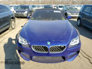 2015 BMW M6 z VIN WBSLZ9C55FD651441, wystawiony jako Copart lot #78511203 z przebiegiem 45 569 mil mil oraz Czysty tytuł • Clean title. Historia ofert i sprzedaży dostępna na DreamBid. Obrazek 5.