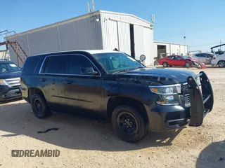 2015 Chevrolet Tahoe Commercial z VIN 1GNLC2EC7FR575386, wystawiony jako IAAI lot #41836137 z przebiegiem 143 231 mil mil oraz . Historia ofert i sprzedaży dostępna na DreamBid. Obrazek 13.