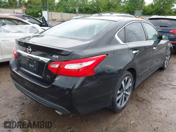 2016 Nissan Altima SR with VIN 1N4AL3AP2GC128229, listed as a IAAI auction lot 42317188 with 153,230 mi miles and . Bid and sale history available at DreamBid. Image 4.