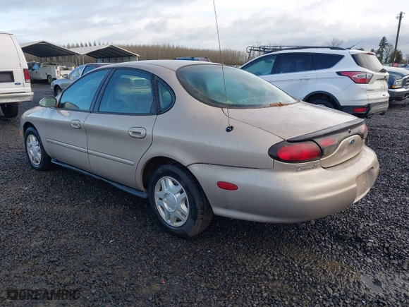 1999 Ford Taurus SE with VIN 1FAFP53U0XG209151, listed as a IAAI auction lot 41778371 with 107,262 mi miles. Bid and sale history available at carsss.com. Image 3.