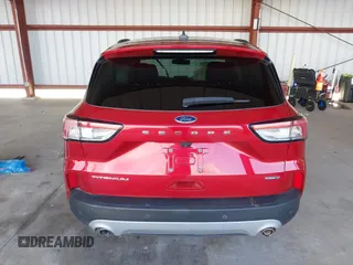 2020 Ford Escape Titanium Hybrid z VIN 1FMCU9DZ1LUC19346, wystawiony jako IAAI lot #41597142 z przebiegiem 75 945 mil mil oraz . Historia ofert i sprzedaży dostępna na DreamBid. Obrazek 16.