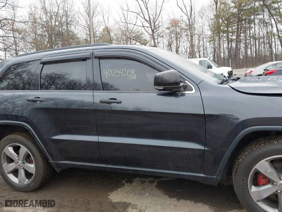 2015 Jeep Grand Cherokee Limited with VIN 1C4RJFBG0FC608061, listed as a IAAI auction lot 40254208 with 91,258 mi miles. Bid and sale history available at carsss.com. Image 14.