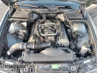2000 BMW 5 Series 540i with VIN WBADN5348YGC95477, listed as a Copart auction lot 87242764 with 135,424 mi miles and Salvage Title. Bid and sale history available at carsss.com. Image 11.