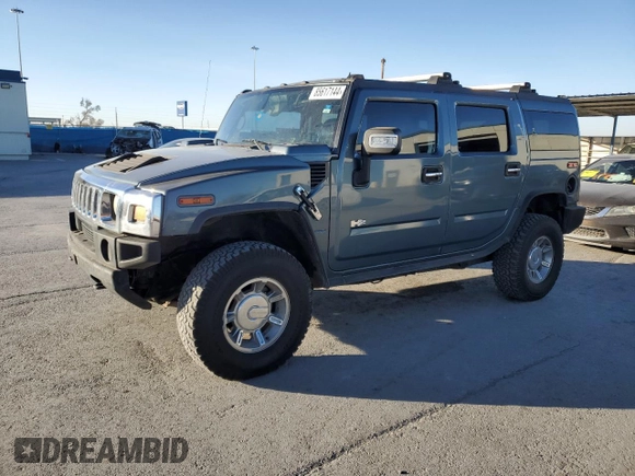 2005 Hummer H2 SUV with VIN 5GRGN23U55H102959, listed as a Copart auction lot 85617144 with 165,513 mi miles and Clean Title. Bid and sale history available at carsss.com. Image 1.