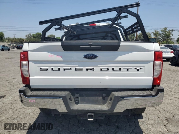 2020 Ford F-250 XL с VIN 1FT7W2BTXLED59332, выставлен на аукционе Copart как лот 57712585 с пробегом 97 358 миль миль и Списание • Salvage title. История ставок и продаж доступна на DreamBid. Изображение 6.