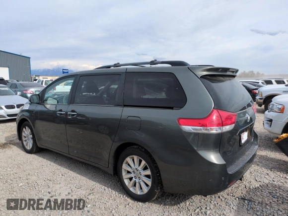 2013 Toyota Sienna XLE with VIN 5TDDK3DC1DS063127, listed as a Copart auction lot 58387015 with 196,574 mi miles and Salvage title. Bid and sale history available at DreamBid. Image 2.