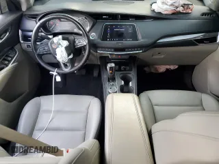 2019 Cadillac XT4 FWD Luxury z VIN 1GYAZAR42KF119510, wystawiony jako Copart lot #48979395 z przebiegiem 57 498 mil mil oraz Szkoda całkowita • Salvage title. Historia ofert i sprzedaży dostępna na DreamBid. Obrazek 8.