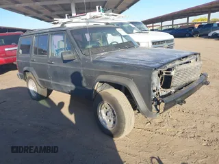 1994 Jeep Cherokee Country z VIN 1J4FJ78S9RL193633, wystawiony jako IAAI lot #42128672 z przebiegiem 231 430 mil mil oraz . Historia ofert i sprzedaży dostępna na DreamBid. Obrazek 1.