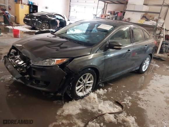 2015 Ford Focus SE with VIN 1FADP3F22FL334793, listed as a IAAI auction lot 41488994 with 58,314 mi miles. Bid and sale history available at carsss.com. Image 2.