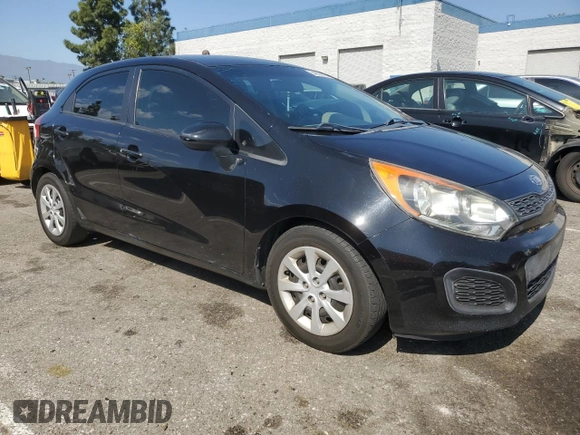 2012 Kia Rio LX with VIN KNADM5A3XC6015728, listed as a Copart auction lot 54952215 with 186,348 mi miles and Salvage Title. Bid and sale history available at DreamBid. Image 4.