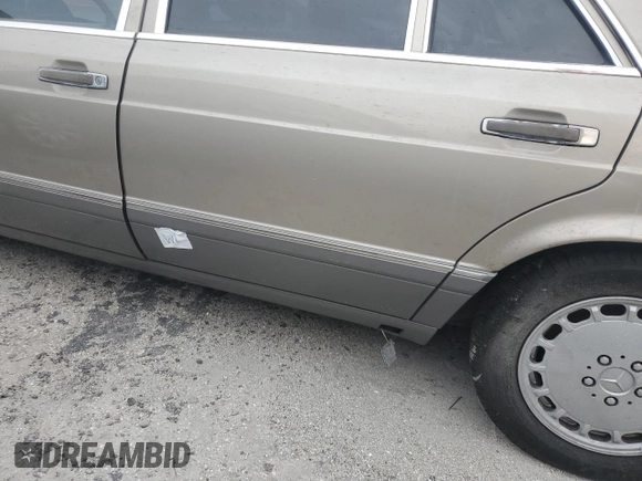 1989 Mercedes-Benz 560 with VIN WDBCA39E1KA479955, listed as a Copart auction lot 76202804 with 132,546 mi miles and Salvage Title. Bid and sale history available at DreamBid. Image 12.