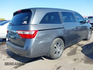 2012 Honda Odyssey EX-L with VIN 5FNRL5H64CB044075, listed as a IAAI auction lot 42094680 with 67,165 mi miles and . Bid and sale history available at carsss.com. Image 4.