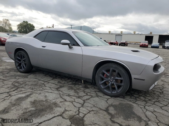 2018 Dodge Challenger R/T with VIN 2C3CDZBT9JH265434, listed as a Copart auction lot 51235425 with 106,779 mi miles and Salvage Title. Bid and sale history available at carsss.com. Image 4.