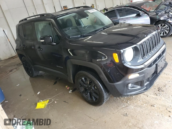 2017 Jeep Renegade Altitude with VIN ZACCJBBB0HPE64660, listed as a Copart auction lot 58768965 with 127,278 mi miles and Salvage title. Bid and sale history available at DreamBid. Image 4.