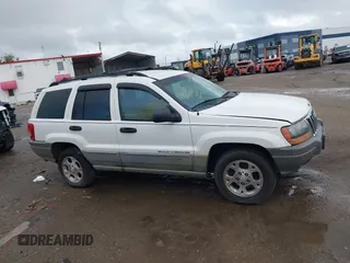 2000 Jeep Grand Cherokee Laredo z VIN 1J4G248S2YC339997, wystawiony jako IAAI lot #42395079 z przebiegiem 261 704 mil mil oraz . Historia ofert i sprzedaży dostępna na DreamBid. Obrazek 13.