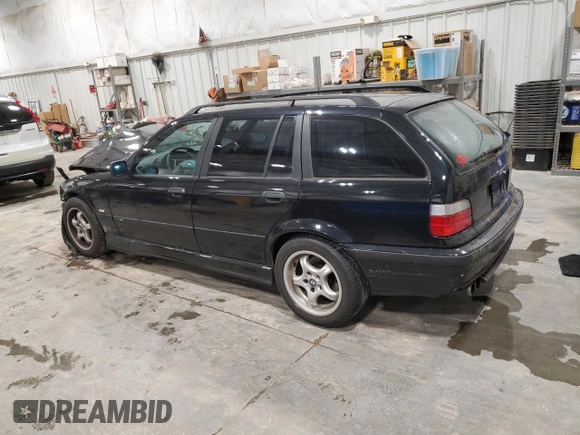 1997 BMW M3 with VIN WBACE11020EZ24250, listed as a Copart auction lot 85107784 with 147,369 mi miles and Clean title. Bid and sale history available at DreamBid. Image 2.