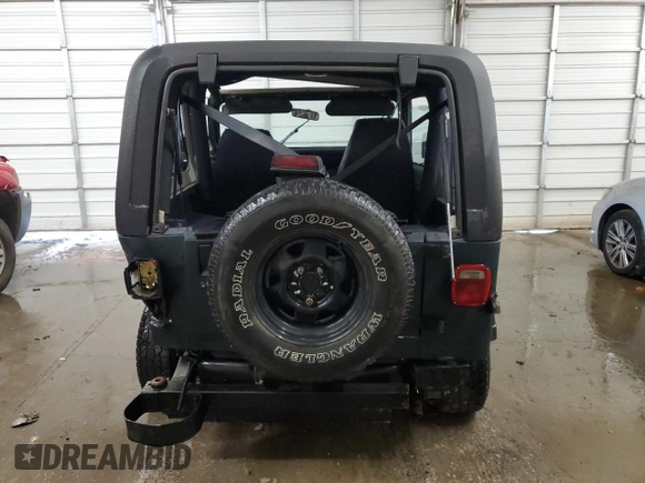 1994 Jeep Wrangler with VIN 1J4FY29S2RP400157, listed as a Copart auction lot 73991994 with 269,207 mi miles and Salvage Title. Bid and sale history available at carsss.com. Image 6.