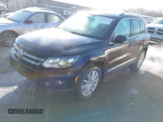 2016 Volkswagen Tiguan S with VIN WVGBV7AX3GW522378, listed as a IAAI auction lot 41391294 with 106,278 mi miles and . Bid and sale history available at DreamBid. Image 2.