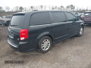 2019 Dodge Grand Caravan SXT with VIN 2C4RDGCG6KR749505, listed as a IAAI auction lot 42087083 with 167,551 mi miles and . Bid and sale history available at DreamBid. Image 4.