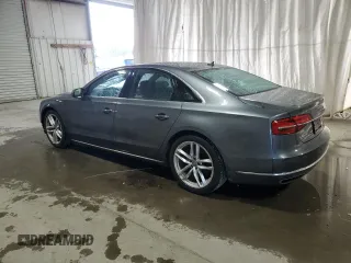 2015 Audi A8 z VIN WAUJGAFDXFN008499, wystawiony jako Copart lot #87658385 z przebiegiem 103 175 mil mil oraz Szkoda całkowita • Salvage title. Historia ofert i sprzedaży dostępna na DreamBid. Obrazek 2.