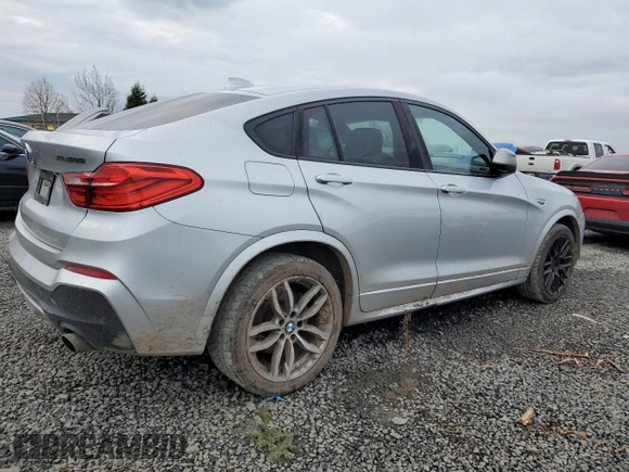 2017 BMW X4 M40i with VIN 5UXXW7C57H0U25268, listed as a Copart auction lot 40370884 with 99,387 mi miles. Bid and sale history available at carsss.com. Image 3.