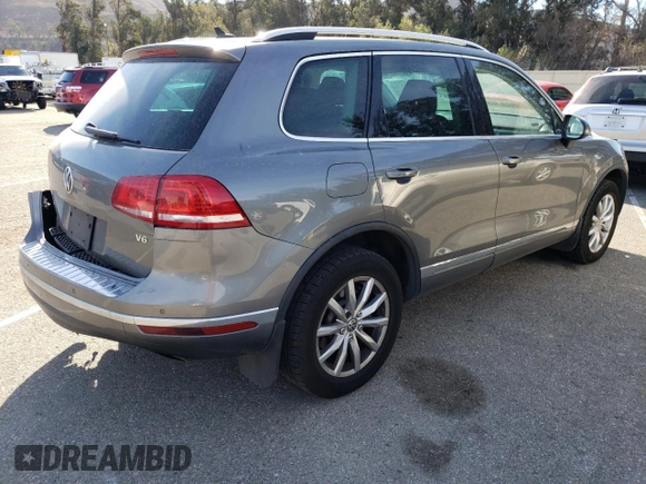 2016 Volkswagen Touareg Sport с VIN WVGEF9BP0GD012604, выставлен на аукционе Copart как лот 85132214 с пробегом 127 155 миль миль и Чистый • Clean title. История ставок и продаж доступна на DreamBid. Изображение 3.