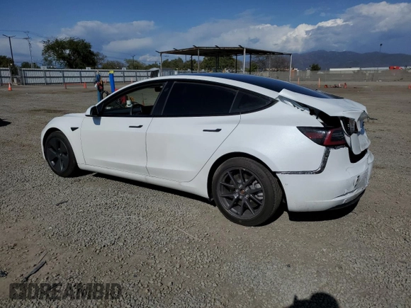 2021 Tesla Model 3 Standard Range Plus with VIN 5YJ3E1EA0MF072457, listed as a Copart auction lot 51666135 with 32,534 mi miles and Salvage Title. Bid and sale history available at carsss.com. Image 2.
