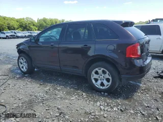 2012 Ford Edge SEL with VIN 2FMDK3JC1CBA77657, listed as a Copart auction lot 52283544 with 241,718 mi miles and Salvage Title. Bid and sale history available at carsss.com. Image 2.