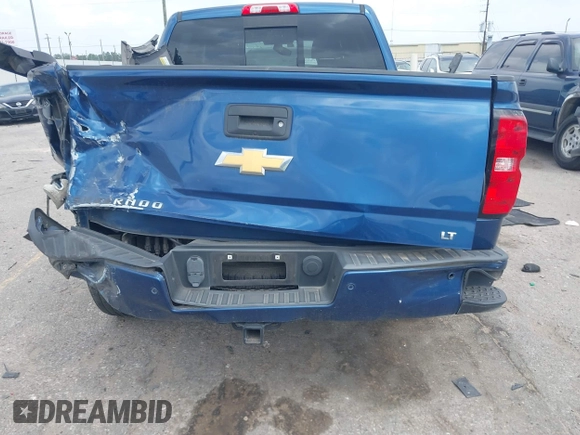 2017 Chevrolet Silverado 1500 LT with VIN 3GCUKREC8HG462719, listed as a IAAI auction lot 41940176 with 380,676 mi miles and . Bid and sale history available at DreamBid. Image 16.