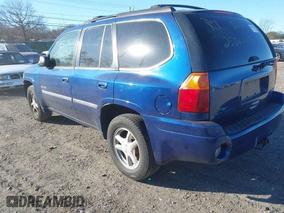 2006 GMC Envoy SLT with VIN 1GKDT13S762170322, listed as a IAAI auction lot 41324540 with 999,999 mi miles. Bid and sale history available at carsss.com. Image 3.