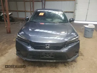 2022 Honda Civic Sport z VIN 2HGFE2F55NH111268, wystawiony jako Copart lot #57655735 z przebiegiem Nie podano mil oraz Szkoda całkowita • Salvage title. Historia ofert i sprzedaży dostępna na DreamBid. Obrazek 5.