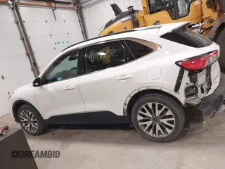 2021 Ford Escape Titanium Hybrid с VIN 1FMCU9DZXMUB03855, выставлен на аукционе IAAI как лот 41498132 с пробегом 63 892 миль миль и . История ставок и продаж доступна на DreamBid. Изображение 14.