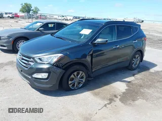 2014 Hyundai Santa Fe with VIN 5XYZUDLB0EG187984, listed as a IAAI auction lot 42607599 with 111,594 mi miles and . Bid and sale history available at DreamBid. Image 17.