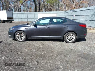 2011 Kia Optima EX with VIN KNAGN4A61B5131919, listed as a IAAI auction lot 41740091 with 102,065 mi miles and . Bid and sale history available at carsss.com. Image 14.