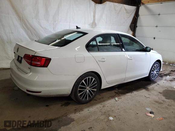 2015 Volkswagen Jetta SE with VIN 3VWD17AJ3FM224154, listed as a Copart auction lot 62846585 with 118,128 mi miles and Salvage title. Bid and sale history available at DreamBid. Image 3.