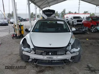 2020 Tesla Model 3 Long Range with VIN 5YJ3E1EB5LF801530, listed as a IAAI auction lot 41682050 with 65,743 mi miles. Bid and sale history available at carsss.com. Image 12.