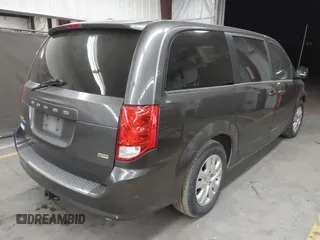 2018 Dodge Grand Caravan SE with VIN 2C4RDGBG8JR230875, listed as a IAAI auction lot 42062774 with 194,781 mi miles and . Bid and sale history available at DreamBid. Image 4.