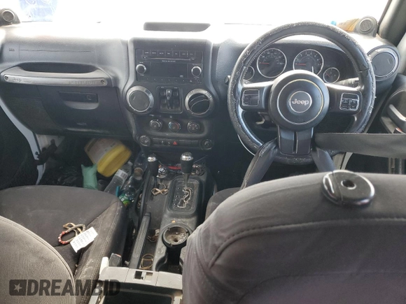 2013 Jeep Wrangler Unlimited Sport RHD с VIN 1C4BJWKG8DL573266, выставлен на аукционе Copart как лот 43340735 с пробегом 275 994 миль миль и Списание • Salvage title. История ставок и продаж доступна на DreamBid. Изображение 8.