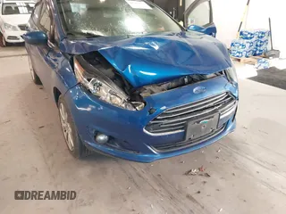 2019 Ford Fiesta SE with VIN 3FADP4EJ6KM124270, listed as a IAAI auction lot 40962134 with 122,757 mi miles. Bid and sale history available at carsss.com. Image 6.