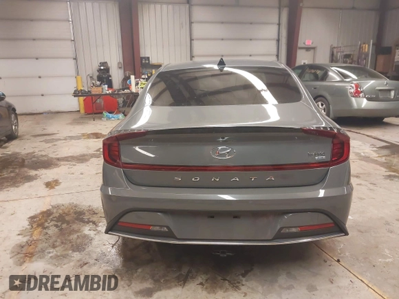 2022 Hyundai Sonata Hybrid Blue with VIN KMHL24JJ3NA048305, listed as a IAAI auction lot 41572735 with 88,085 mi miles. Bid and sale history available at carsss.com. Image 16.