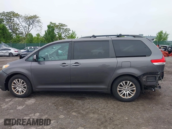 2014 Toyota Sienna XLE with VIN 5TDYK3DC0ES436502, listed as a IAAI auction lot 42180990 with 154,839 mi miles and . Bid and sale history available at DreamBid. Image 15.