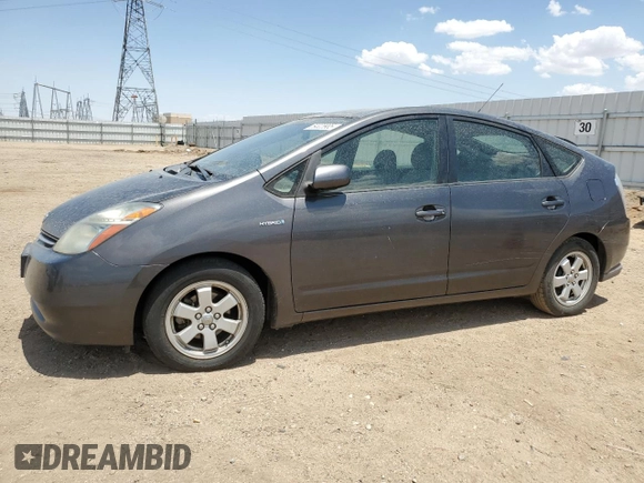 2007 Toyota Prius z VIN JTDKB20U773262222, wystawiony jako Copart lot #59323905 z przebiegiem 138 274 mil mil oraz Czysty tytuł • Clean title. Historia ofert i sprzedaży dostępna na DreamBid. Obrazek 1.