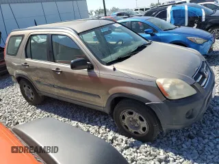 2006 Honda CR-V LX with VIN SHSRD68516U408525, listed as a Copart auction lot 52721685 with 213,827 mi miles and Salvage Title. Bid and sale history available at DreamBid. Image 4.