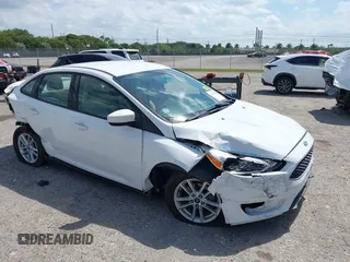 2018 Ford Focus SE with VIN 1FADP3F29JL213008, listed as a IAAI auction lot 41790224 with 85,056 mi miles and . Bid and sale history available at DreamBid. Image 1.