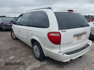 2005 Chrysler Town & Country LX with VIN 2C4GP44RX5R590022, listed as a IAAI auction lot 42058881 with 191,272 mi miles and . Bid and sale history available at DreamBid. Image 3.
