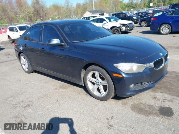 2013 BMW 3 Series 328i xDrive with VIN WBA3B3G54DNR80235, listed as a IAAI auction lot 42105883 with 144,023 mi miles. Bid and sale history available at carsss.com. Image 1.