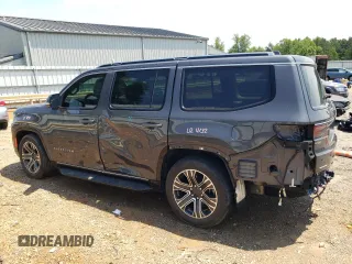 2022 Jeep Wagoneer Series III with VIN 1C4SJVDT8NS201275, listed as a Copart auction lot 63481615 with 57,569 mi miles and Salvage title. Bid and sale history available at DreamBid. Image 2.