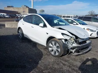 2023 Tesla Model Y Long Range with VIN 7SAYGAEE9PF598970, listed as a IAAI auction lot 41196947 with Not provided miles and . Bid and sale history available at DreamBid. Image 1.