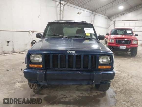 2000 Jeep Cherokee Classic with VIN 1J4FF58SXYL142372, listed as a IAAI auction lot 41820743 with 131,526 mi miles. Bid and sale history available at carsss.com. Image 6.
